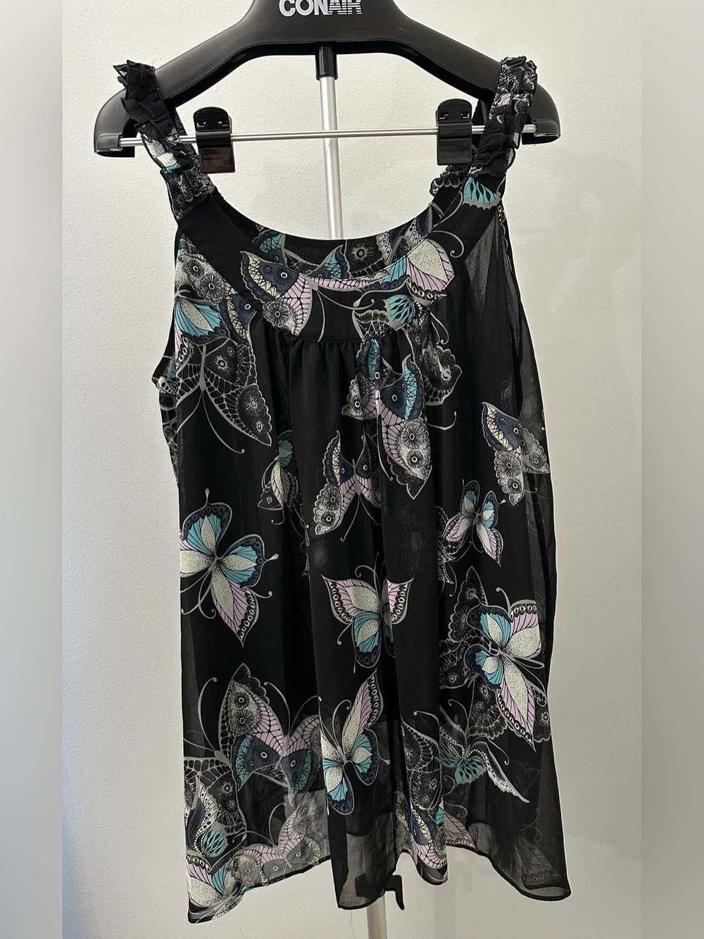Apostrophe Sleeveless Blouse
